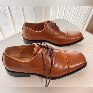 Brand Alfani, size 10.5 , color brown. Light wear and it's in good condition.